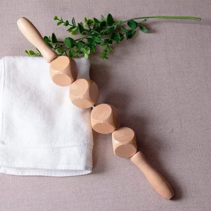 Rouleau de massage en bois pour la cellulite