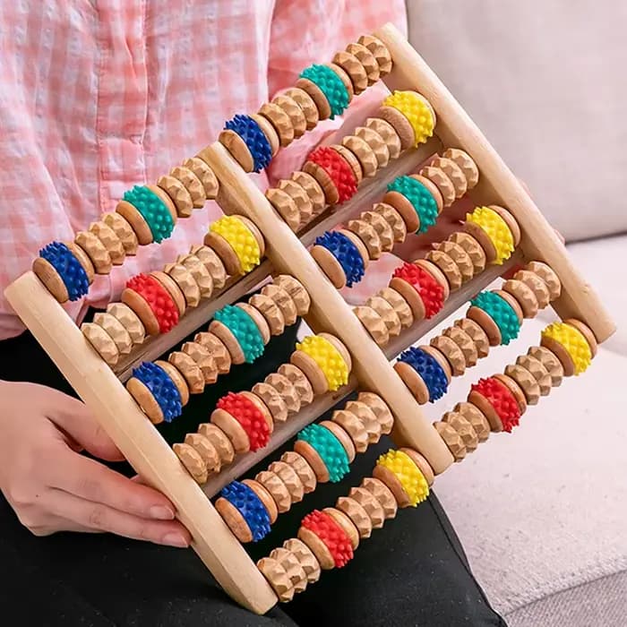 Rouleau de massage pour les pieds en bois