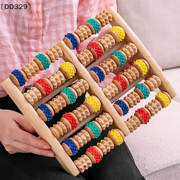 Rouleau de massage pour les pieds en bois
