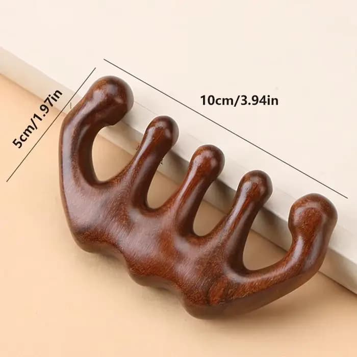 Peigne de massage en bois pour la tête
