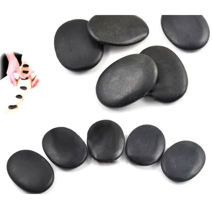 Ensemble de pierres naturelles de massage au charbon chaud