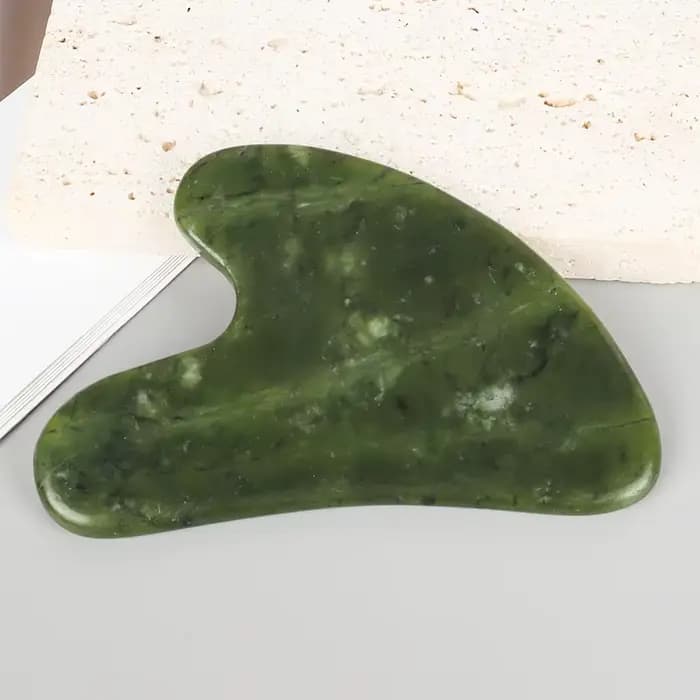Outil de massage Gua Sha en jade Xiuyan