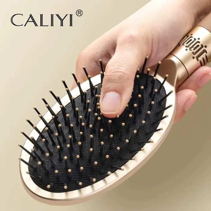 CALIYI cheveux Massage coussin d'air peigne brosse cuir chevelu