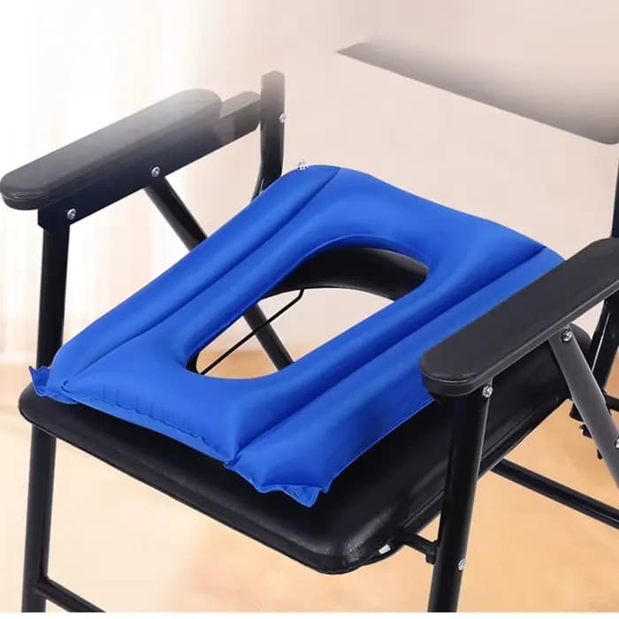 Coussin de siège gonflable pour fauteuil roulant monté sur le lit